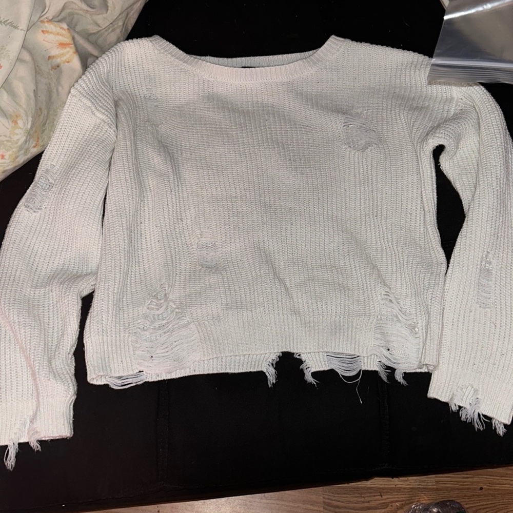 Large white distressed sweater